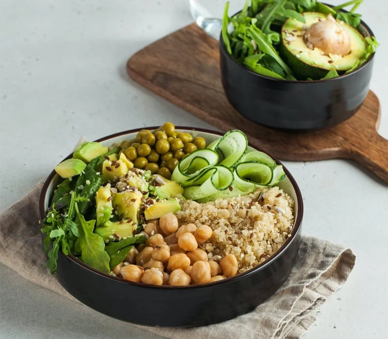 healthy-vegetable-lunch-from-the-buddha-bowl-with-quinoa-avocado-chickpeas-e1682306640518